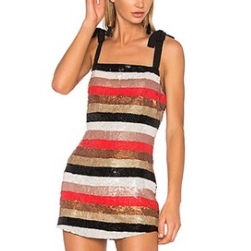 NEW WITH TAGS. Adorable sequin mini dress